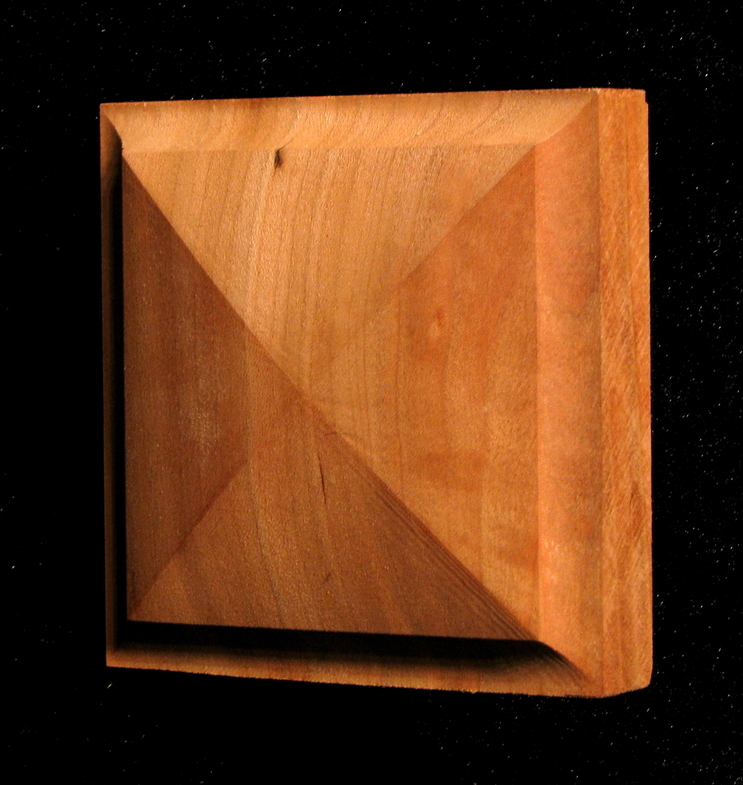 Block Four Corners carved wood